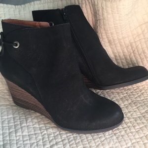Black wedge booties